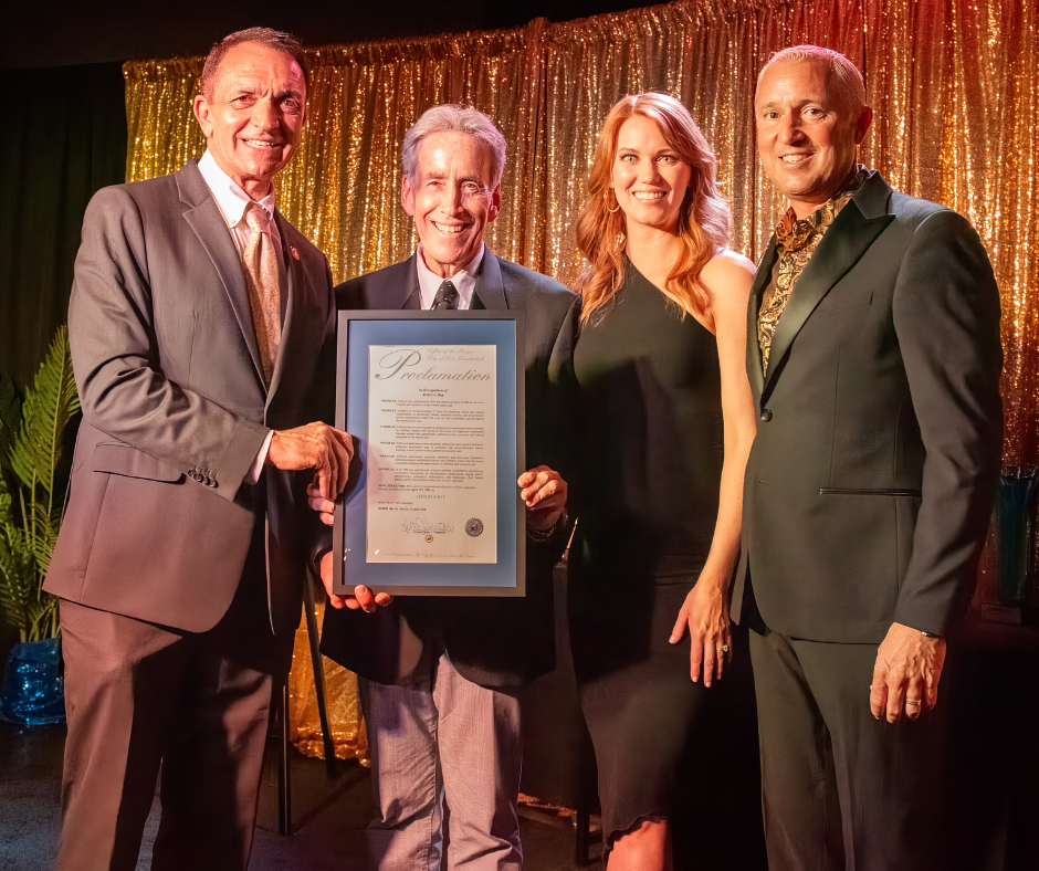 Fort Lauderdale Mayor Dean Trantalis and Vice Mayor Steve Feldman present a proclamation to ArtServe Board Chair Molly Turner and CEO Jason Hughes