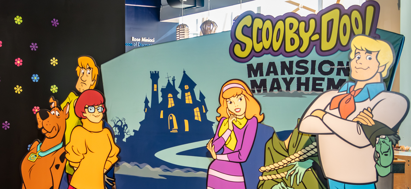With the case closed and the thieving “ghost” now unmasked, amateur detectives can pose with the gang for a photo at the end of the “Scooby-Doo! Mansion Mayhem” exhibit at Fort Lauderdale’s Museum of Discovery and Science. (Photo by Michael Murphy/The Museum of Discovery and Science)