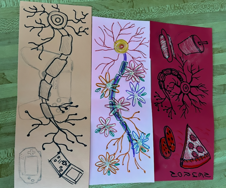 Lindsey Wuest co-taught the interactive “Art and the Brain” class with Kristin Beck. Attendees drew pictures of neurons and discussed what it would be like to lose their earliest and favorite memories. (Photo courtesy of Lindsey Wuest.)