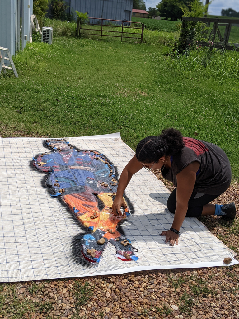 With each portrait Kandy Lopez creates two pieces, the image and the silhouette is left behind. (Photo by Kandy Lopez)