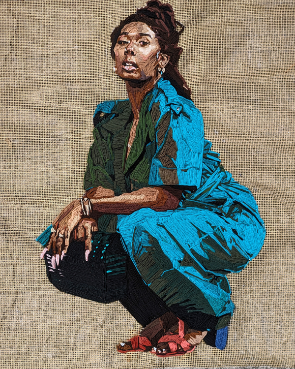Portrait Artist Kandy Lopez’s work, “Tierra Armstrong” made with yarn and spray paint on hook mesh. (Photo by Kandy Lopez)