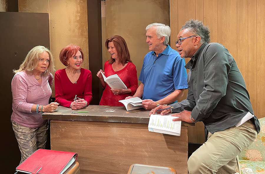 From left, Director Deborah Kondelik and Producer Ellen Wacher chat with cast members Janice Hamilton, Peter W. Galman and André Gainey during the 2023 run of “Morning After Grace.” Kondelik is directing the current production of Tina Howe’s “Painting Churches.” (Photo by Carol Kassie)