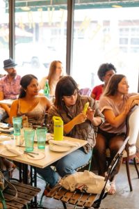 community listening to poetry