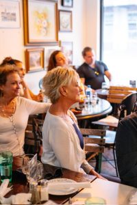 community listening to poetry