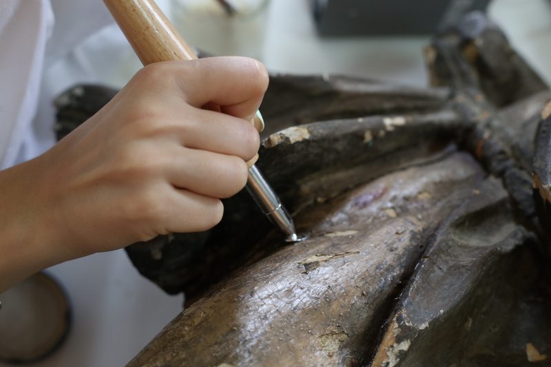 gold with carvings on the old icon. restoration of the icon, gold restoration, old icon, old painting, restoration. conservation of paintings