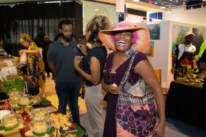 Woman smiling at camera at Rum Cake Fest