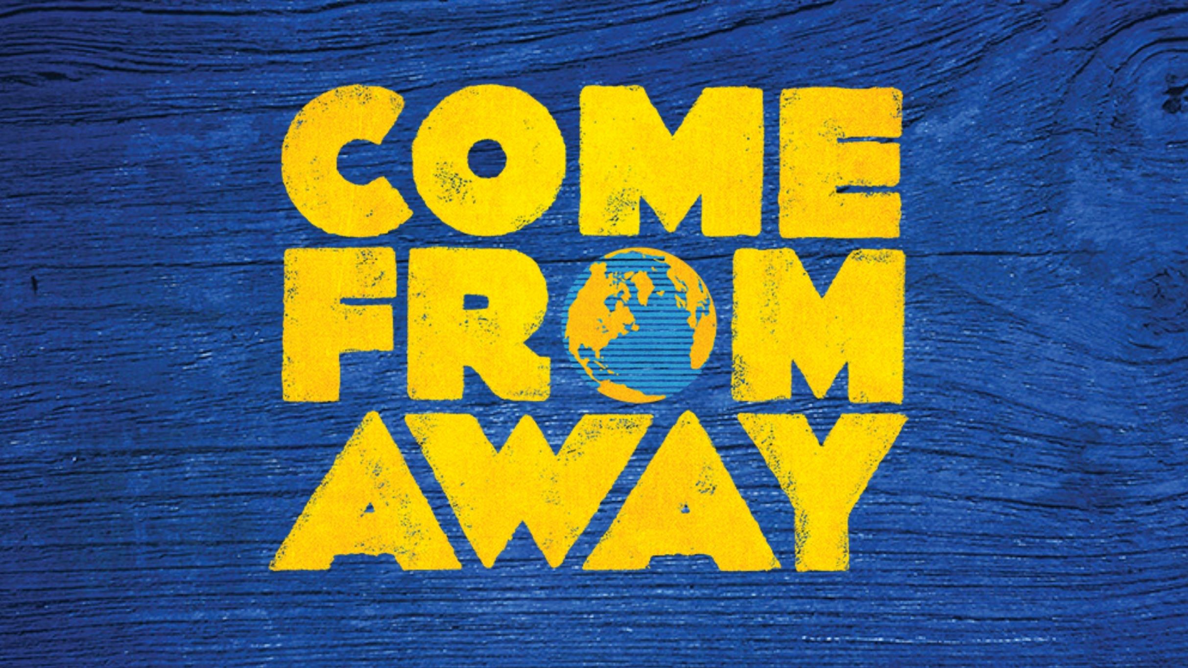 “Come From Away” tells the story of a small town in Newfoundland, Canada who open their homes to stranded travelers after the September 11th attacks in 2001 (Photo courtesy of Slow Burn Theatre Company)