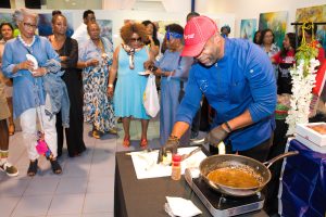 Chef doing a cooking demo at Rum Cake Fest